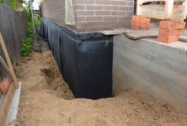 SJ Waterproofing Pros technician performing targeted Exterior Waterproofing assessment in Grant, AL